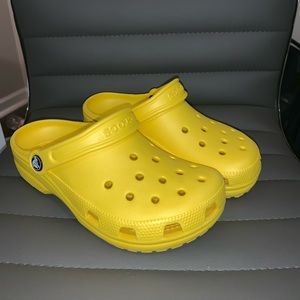 Bright yellow crocs